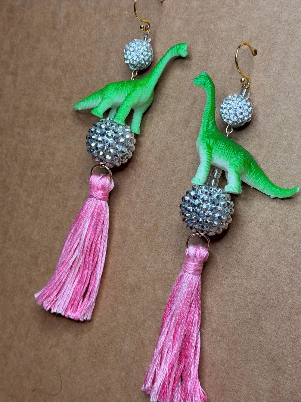 Playful Disco Brontosaurus Dinosaur Tassel Earrings with Pink Fringe - Picture 2 of 4